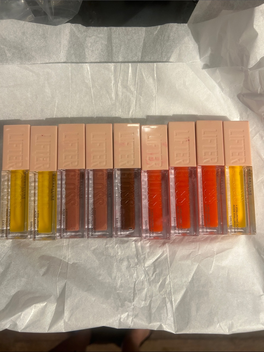 Maybelline Lifter Gloss lot of 9. Brand new.